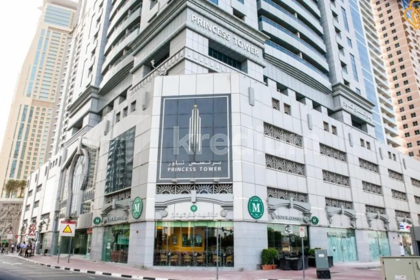 Entrance to a modern building with a Princess tower sign