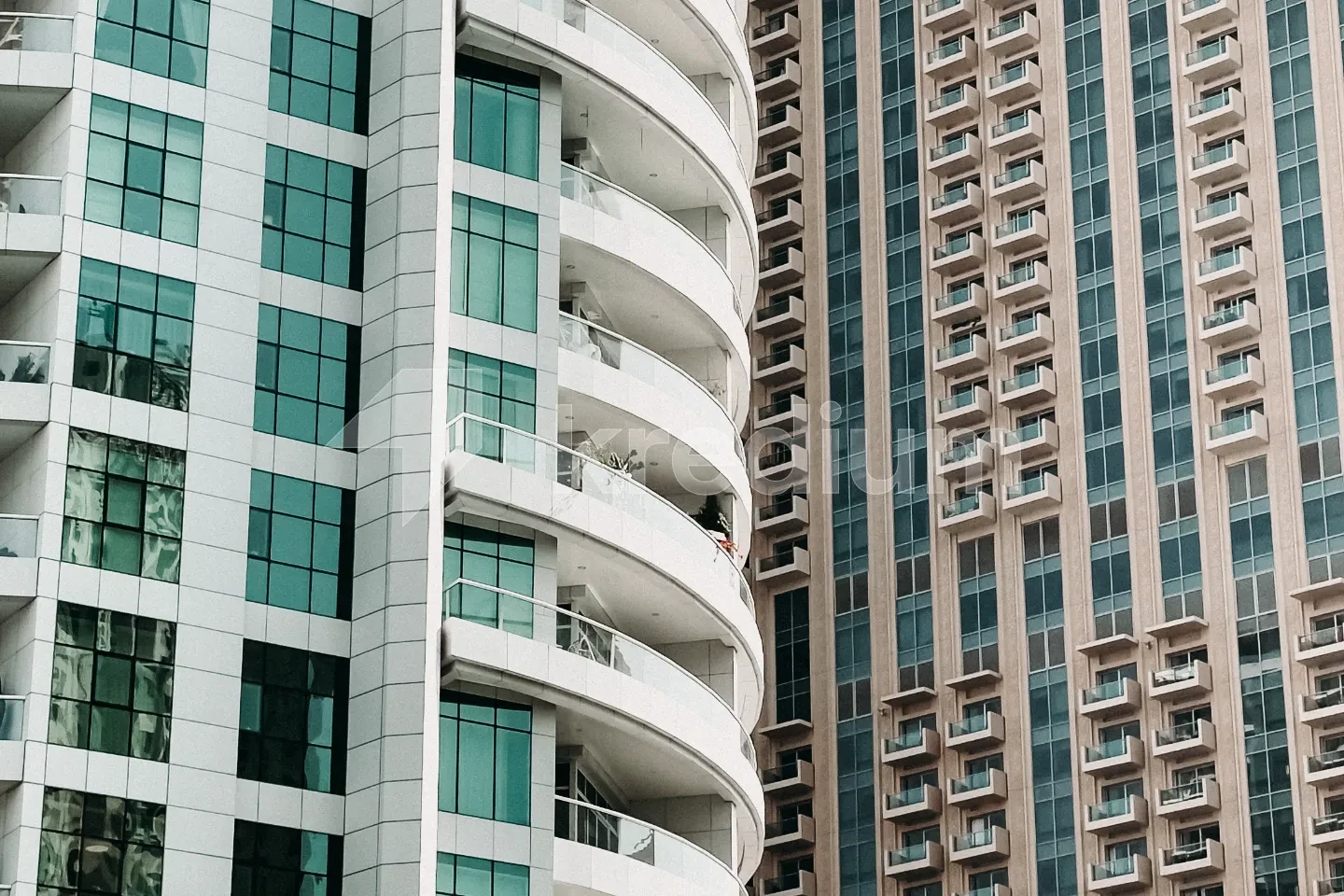 An elegant building with round balconies
