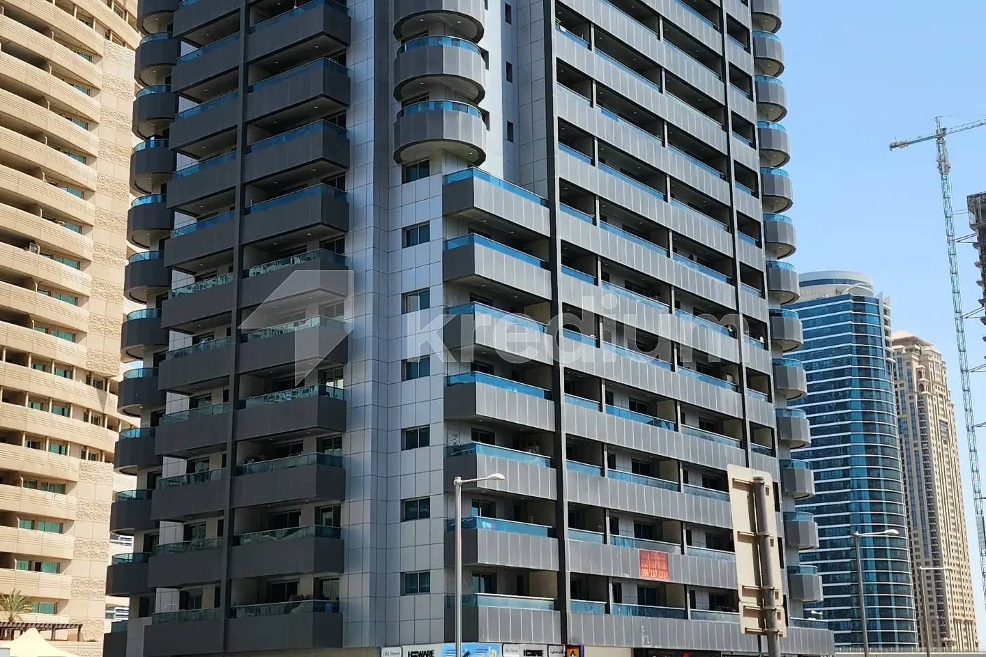 Dark elegant building in a residential neighborhood.