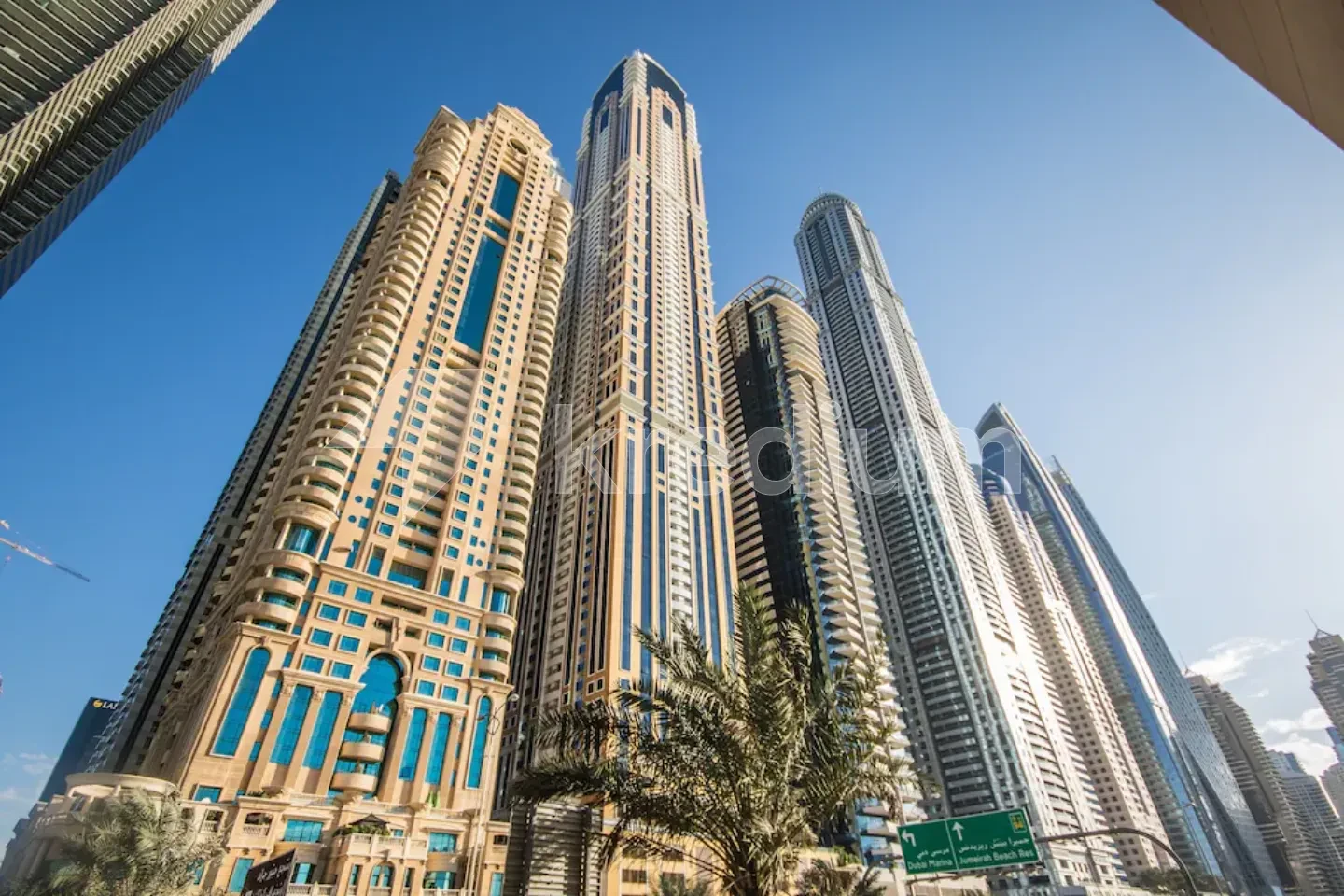 A group of elegant glass and steel towers