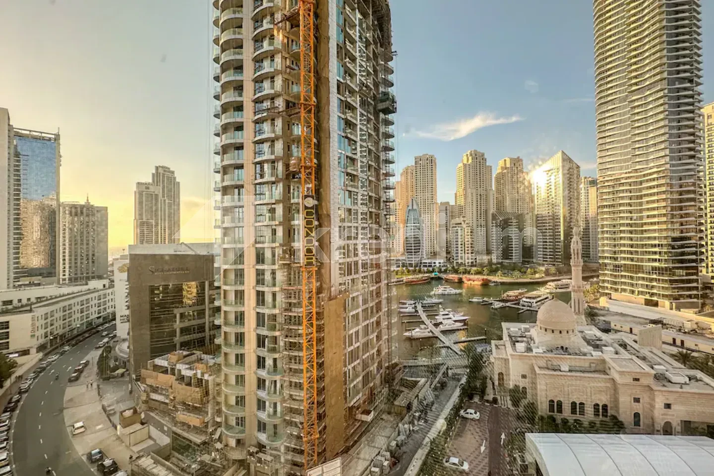 A stylish tower in an urban neighborhood