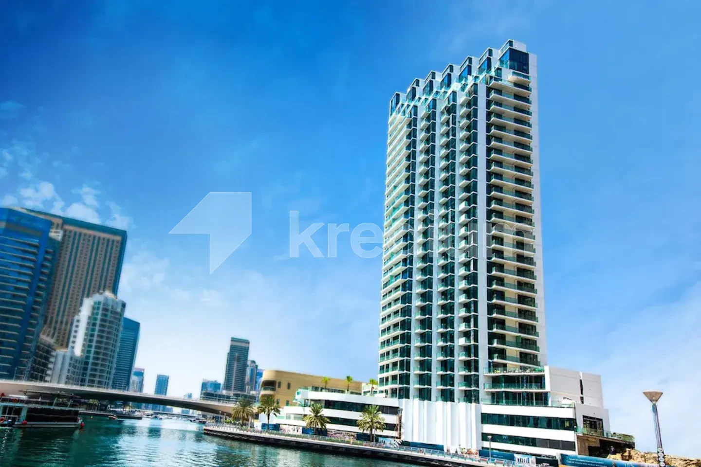 A luxurious tower overlooking a canal