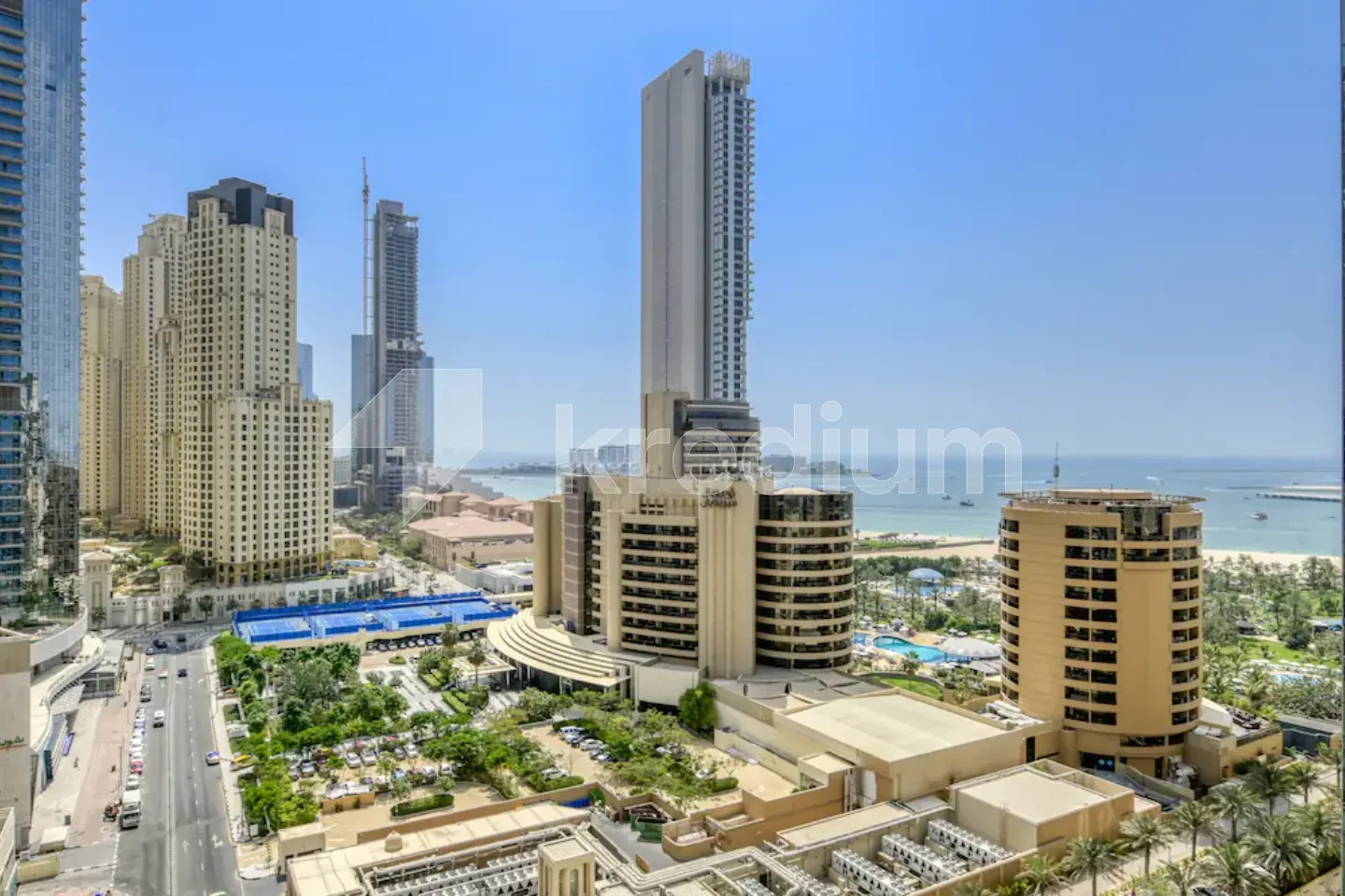 Sleek modern tower overlooking a beach