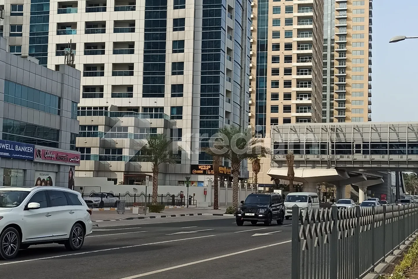 Modern buildings next to a busy road