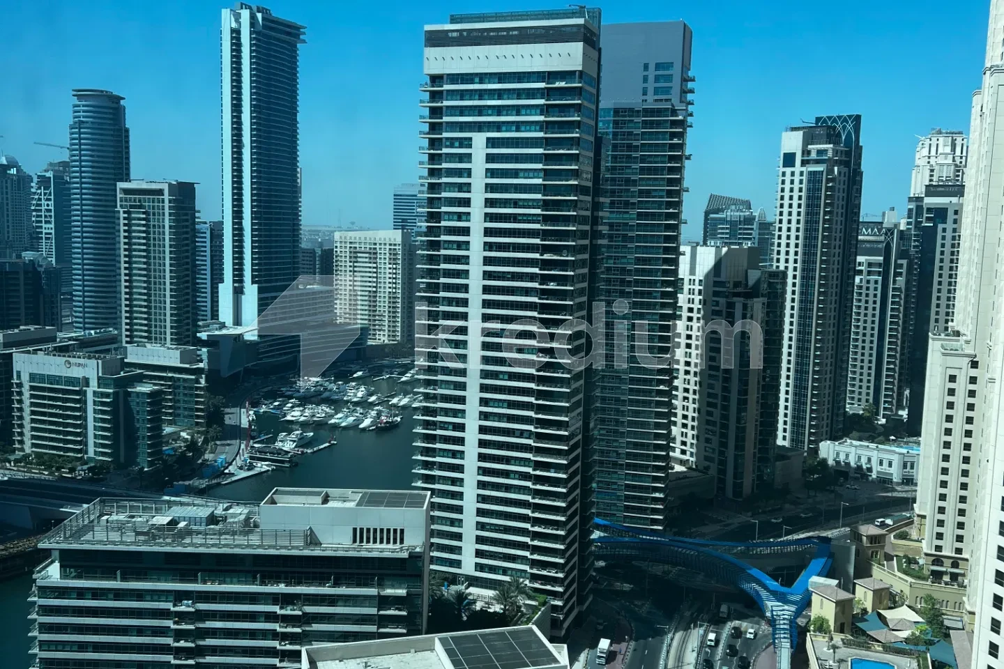 Multi-story residential tower in a modern neighborhood
