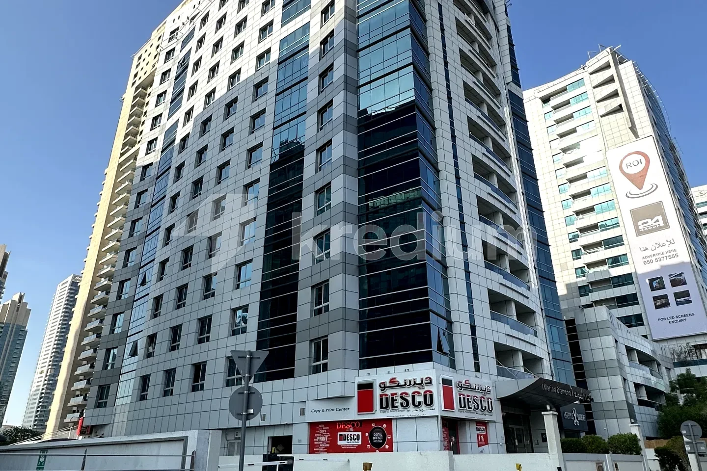 Modern residential building in a busy neighborhood