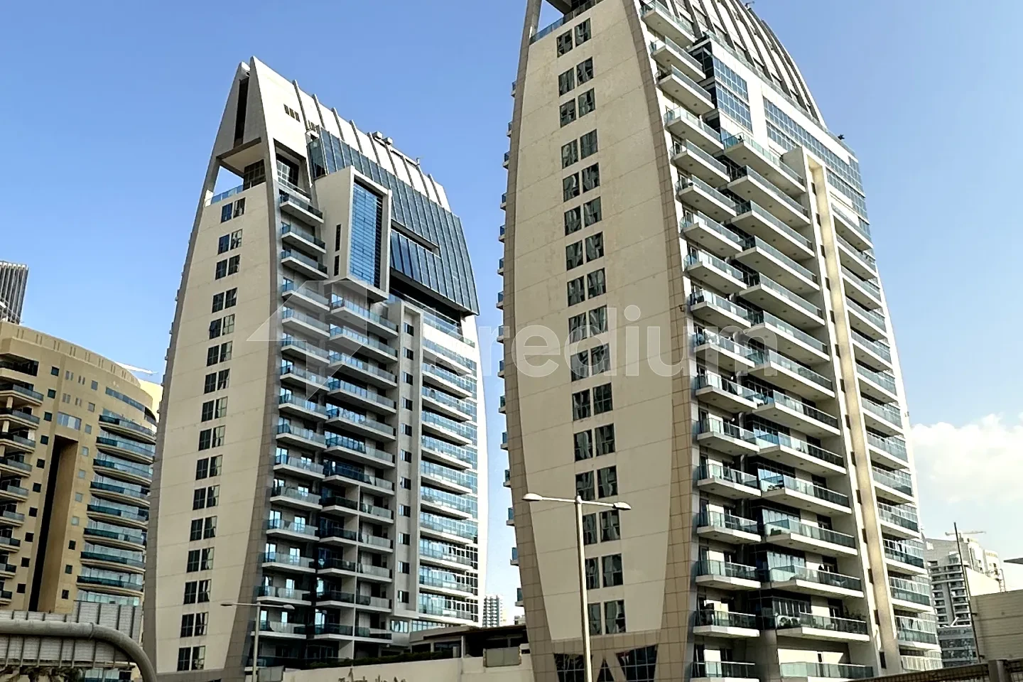 Two identical towers connected at the base