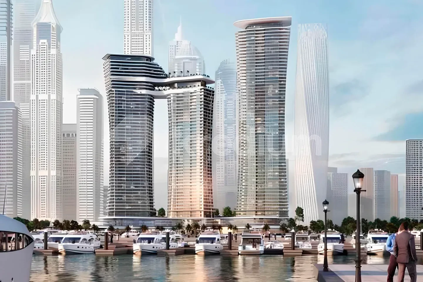 Three luxurious glass skyscrapers overlooking a marina