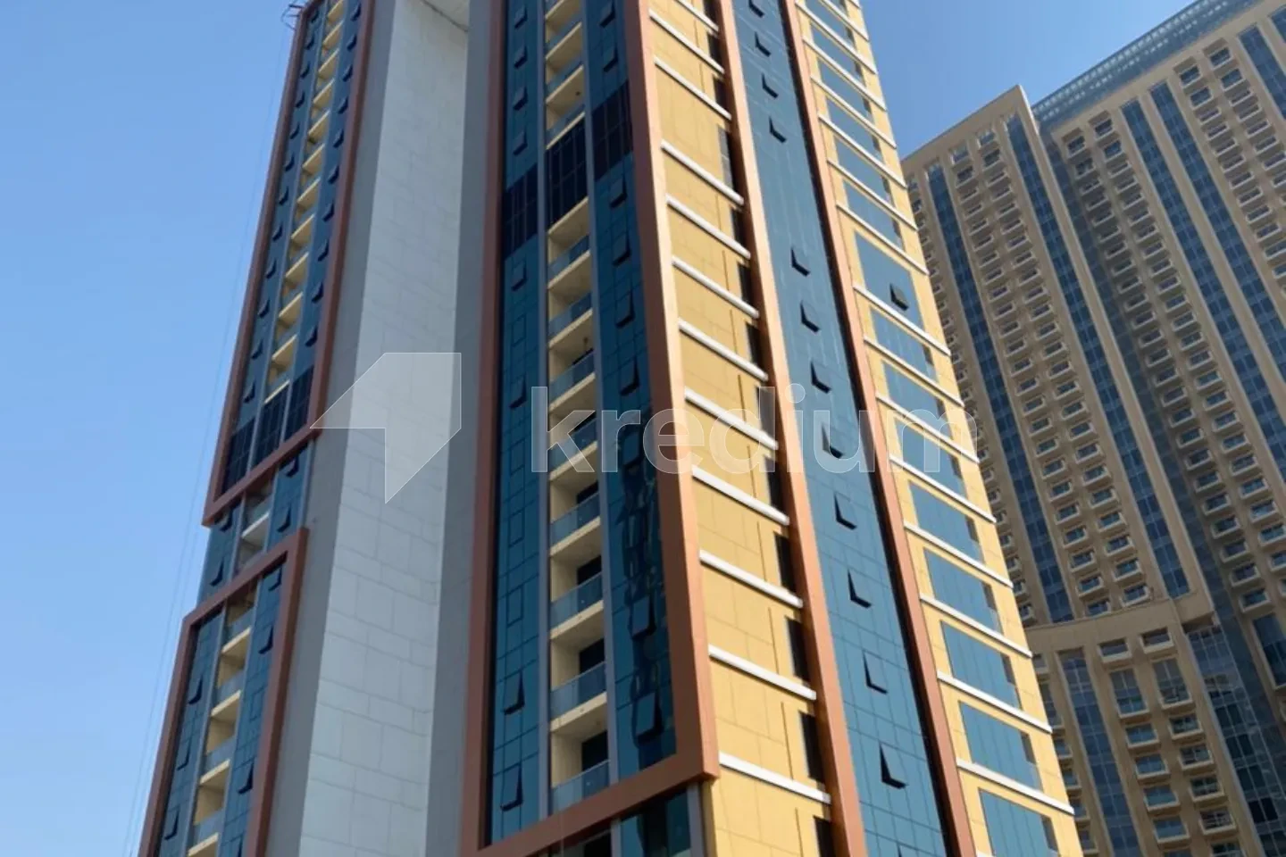 A sleek high-rise residential building